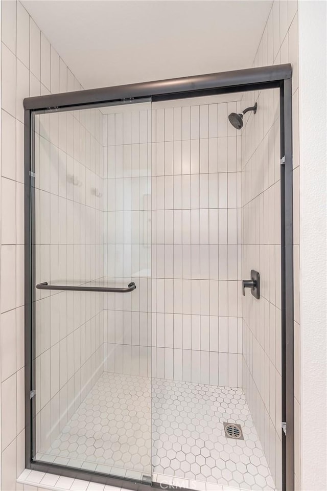 bathroom featuring walk in shower