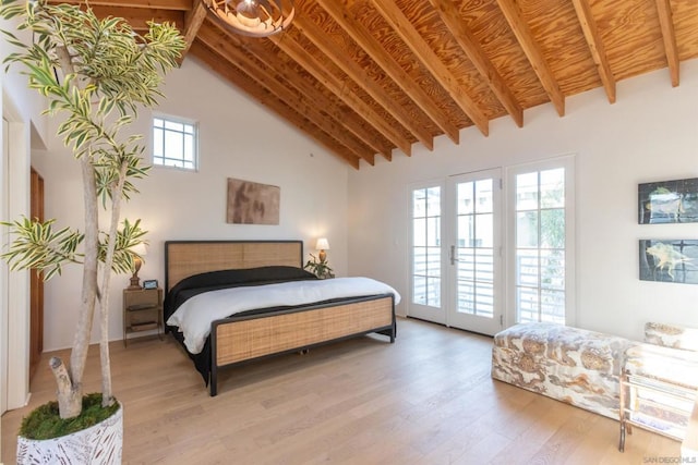 bedroom with hardwood / wood-style flooring, high vaulted ceiling, access to outside, and beamed ceiling