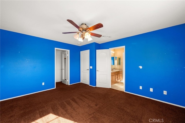 unfurnished bedroom with ceiling fan, light carpet, and ensuite bath