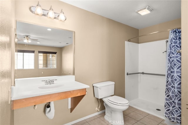 bathroom with tile patterned floors, toilet, sink, a shower with shower curtain, and ceiling fan