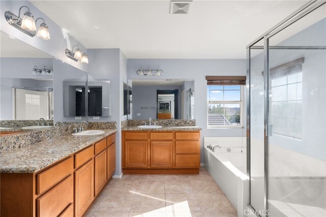 bathroom with vanity, separate shower and tub, and tile patterned flooring