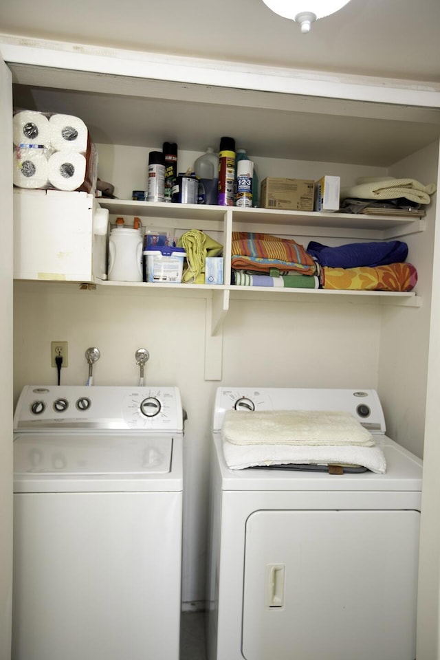 laundry room with washer and dryer