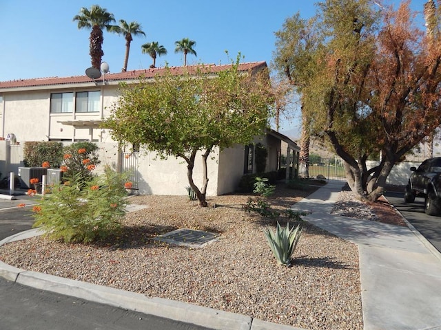 view of front of house featuring central AC