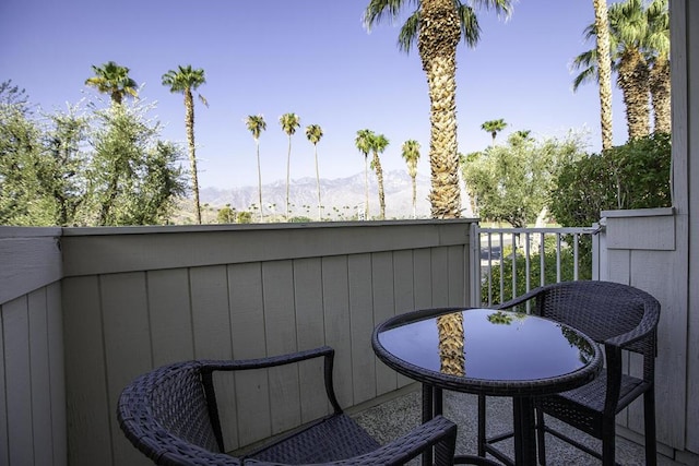 balcony featuring a mountain view