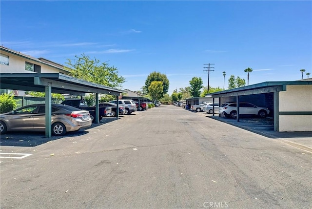 view of car parking featuring a carport