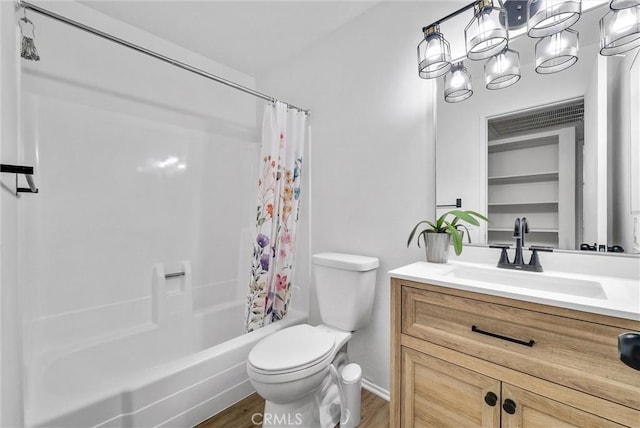 full bathroom featuring toilet, vanity, shower / bath combination with curtain, and hardwood / wood-style floors