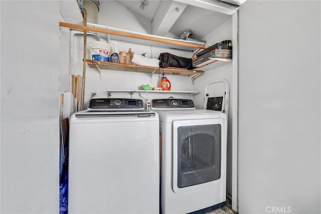 laundry room with washer and clothes dryer