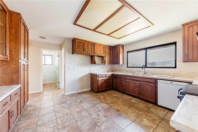 kitchen featuring dishwasher and sink