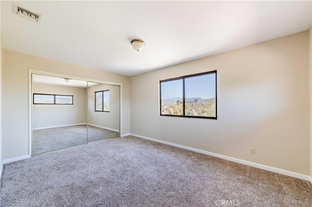 empty room with carpet floors