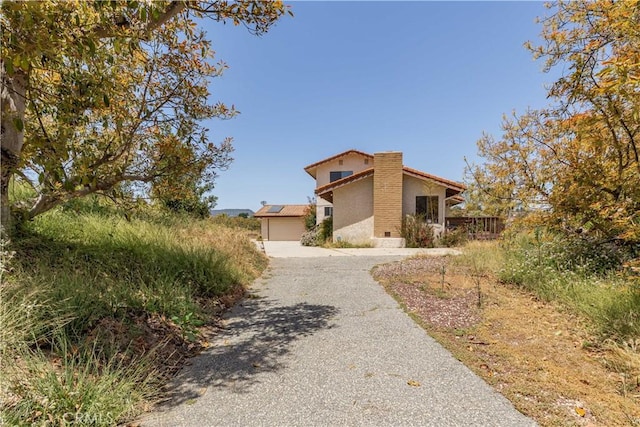 view of home's exterior with a garage