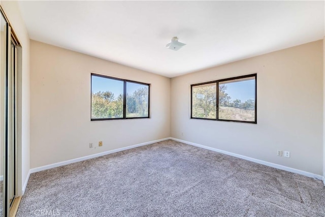 view of carpeted spare room