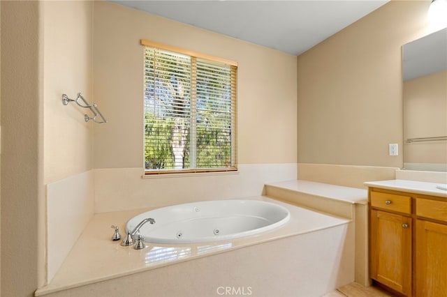 bathroom with a bathtub and vanity