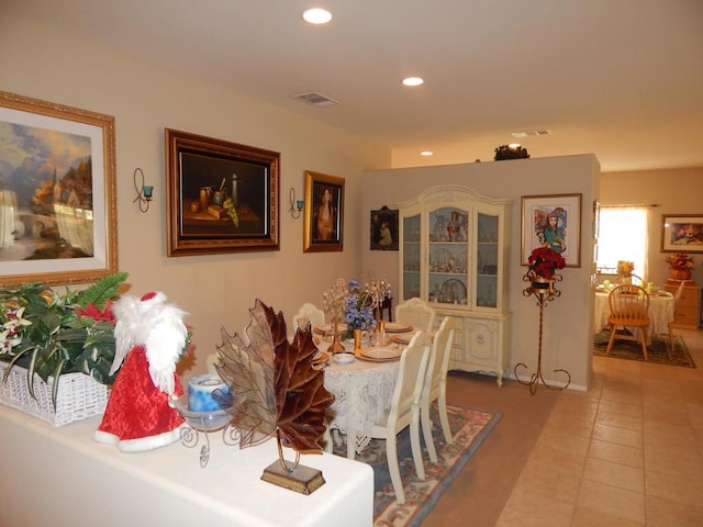 dining room with tile patterned flooring