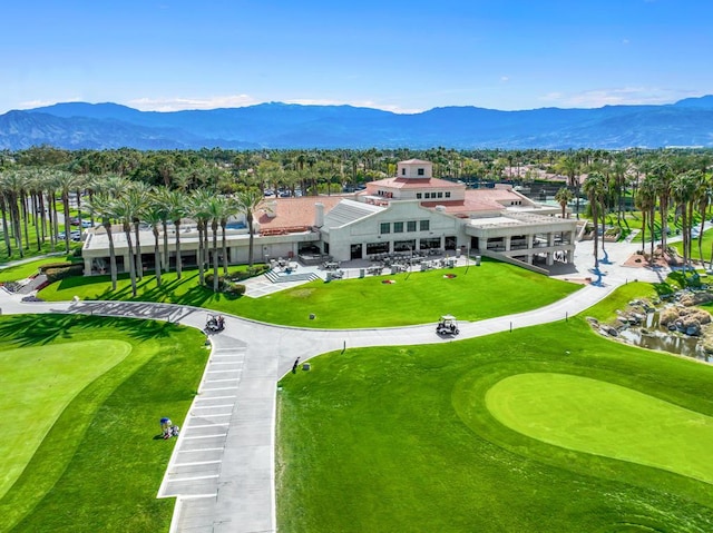 birds eye view of property featuring a mountain view