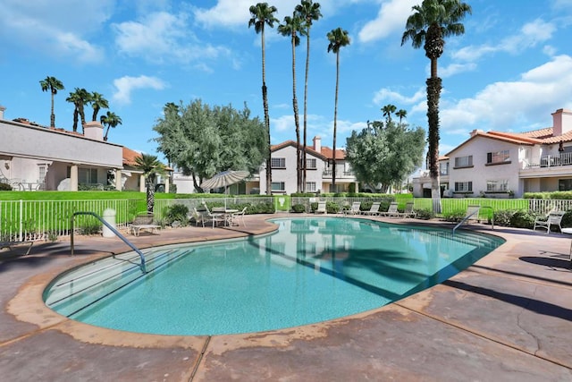 view of pool featuring a patio