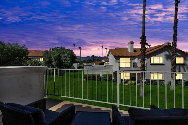 balcony at dusk with outdoor lounge area