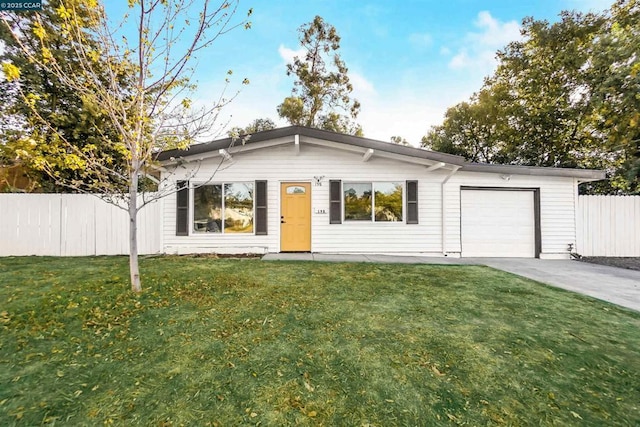 single story home with a front lawn and a garage