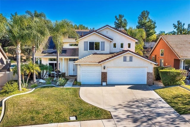 view of front facade featuring a front yard and a garage