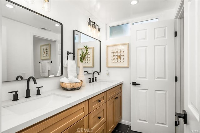 bathroom featuring vanity and tile patterned floors