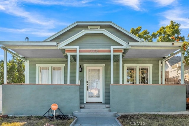 craftsman-style home featuring covered porch