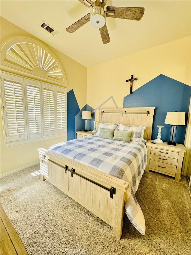 carpeted bedroom featuring ceiling fan