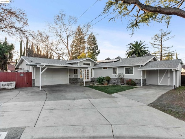 ranch-style home featuring a garage