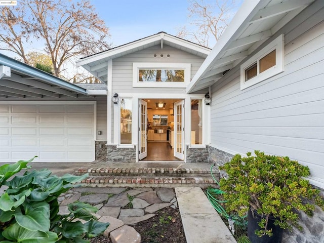 entrance to property featuring a garage