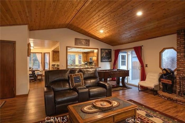 living room featuring vaulted ceiling, wood ceiling, and hardwood / wood-style floors