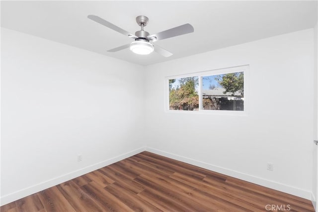 unfurnished room with ceiling fan and hardwood / wood-style floors