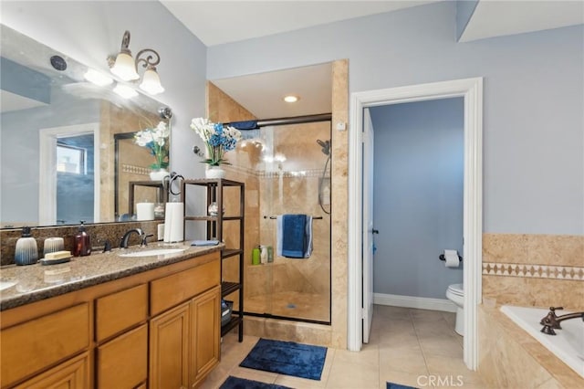 full bathroom featuring tile patterned flooring, plus walk in shower, vanity, and toilet