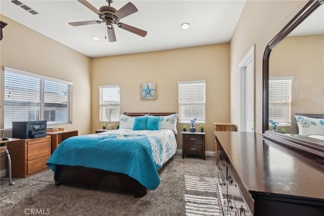 carpeted bedroom with ceiling fan