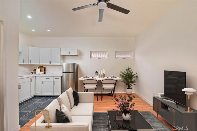 living room with ceiling fan