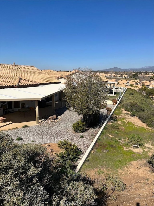 exterior space featuring a mountain view