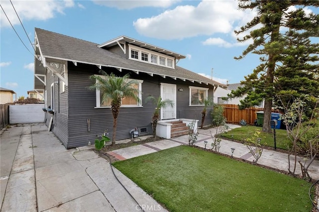 view of front of home with a front yard