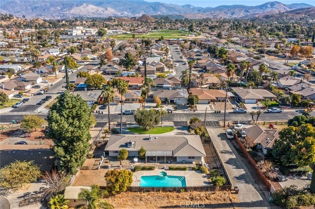 drone / aerial view featuring a mountain view