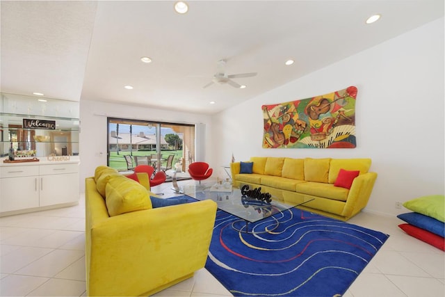 living room featuring ceiling fan and light tile patterned floors