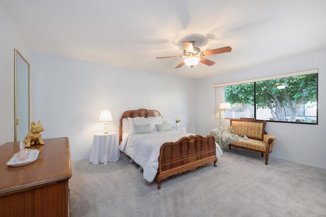 bedroom with ceiling fan and carpet floors