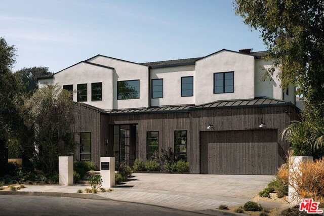 modern farmhouse style home with a garage