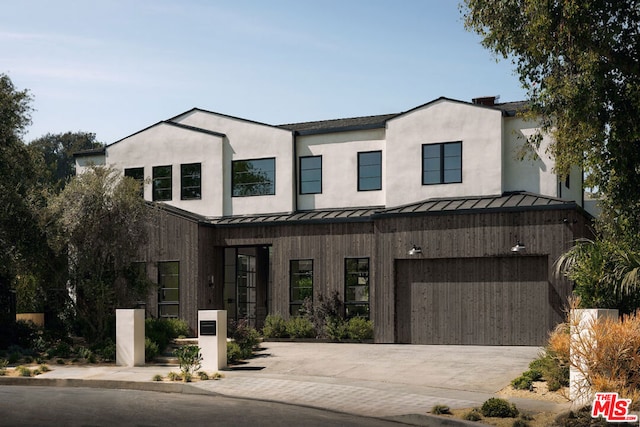 modern farmhouse with a garage