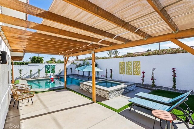 view of patio featuring a pool with connected hot tub and a fenced backyard