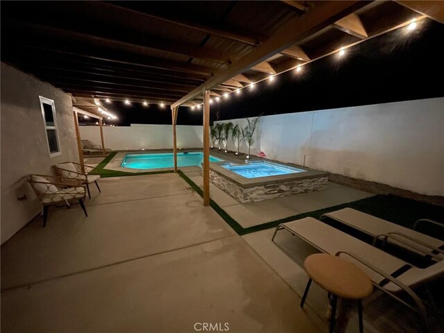 view of pool featuring a fenced backyard, an in ground hot tub, a fenced in pool, and a patio