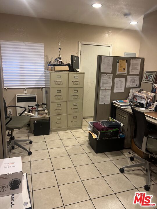 office featuring light tile patterned flooring