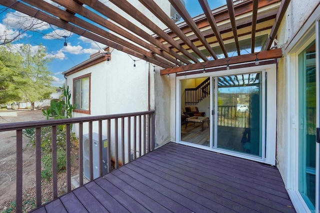 wooden deck with a pergola