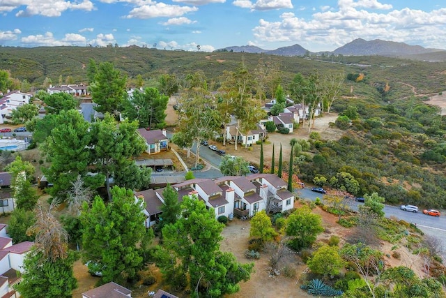 birds eye view of property featuring a mountain view