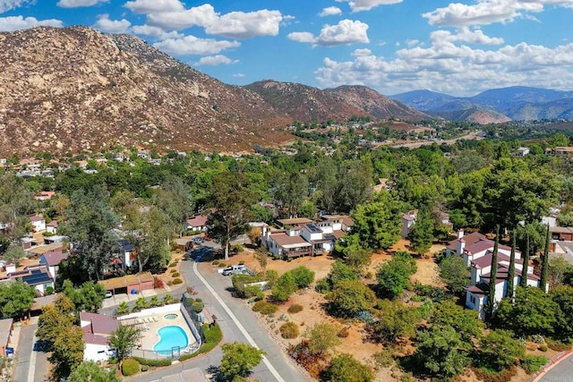 drone / aerial view featuring a mountain view