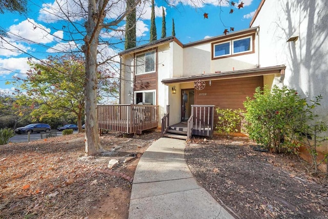 view of front of home with a deck