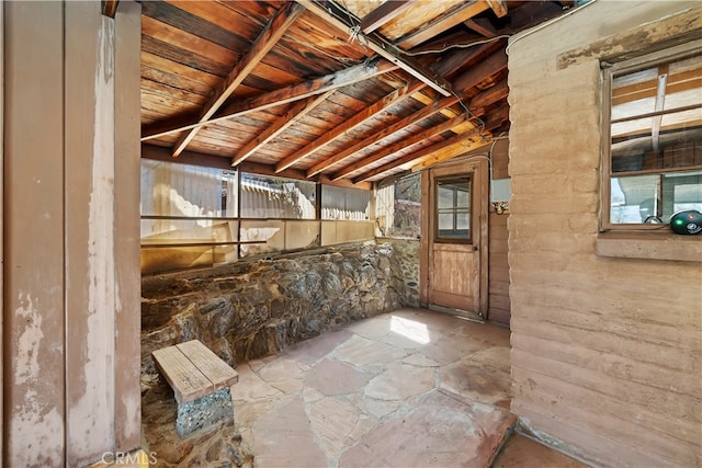 basement with wood ceiling