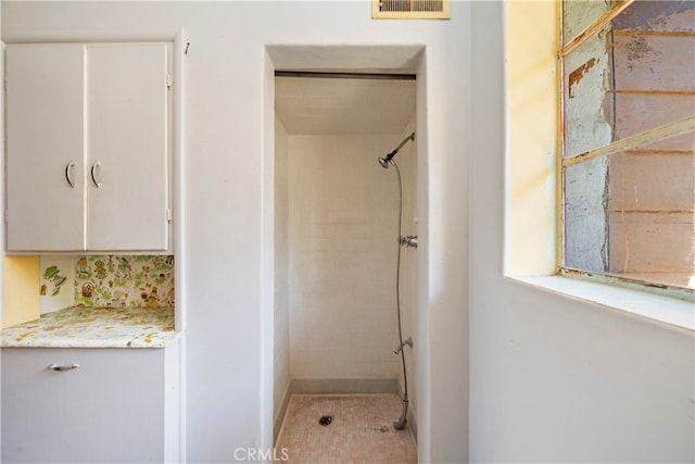 bathroom with tile patterned flooring