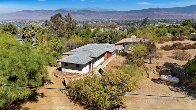 drone / aerial view featuring a mountain view