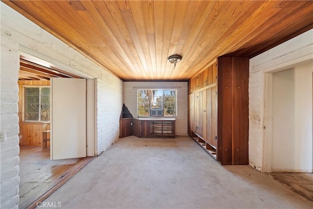 misc room with wood walls and wooden ceiling